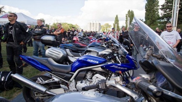 http://freedomwat.ch/wp-content/uploads/2012/09/Bikers-stand-next-to-their-vehicles-as-they-take-part-in-a-protest-of-the-Motorcycle-Action-Group-MAG-against-plans-for-a-European-test-for-motorcycles-in-Brussels-via-AFP.jpg