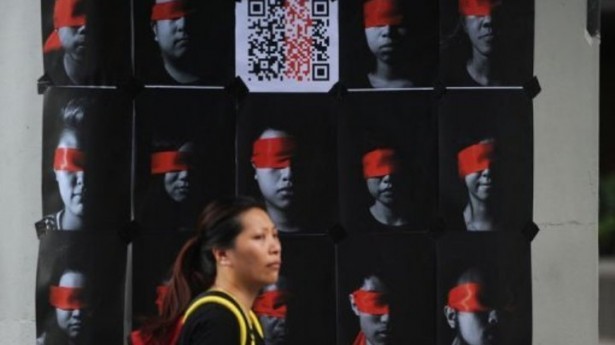 http://freedomwat.ch/wp-content/uploads/2012/09/Hong-Kong-protester-against-Chinese-patriotism-classes-via-AFP-615x3451.jpg