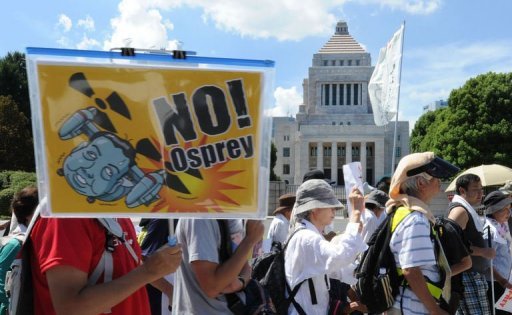 http://freedomwat.ch/wp-content/uploads/2012/09/Protesters-hold-banners-during-a-rally-against-the-deployment-of-US-Osprey-military-aircraft-on-September-9-via-AFP1.jpg