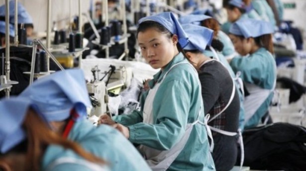 http://freedomwat.ch/wp-content/uploads/2012/09/Woman-working-in-Chinese-factory-via-AFP-615x345.jpg