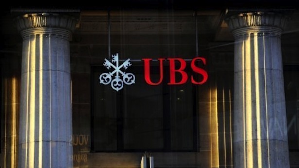 http://freedomwat.ch/wp-content/uploads/2012/12/The-logo-of-a-branch-of-Switzerlands-largest-bank-UBS-is-seen-through-a-window-on-October-4-2010-in-Lausanne.-AFP2.jpg